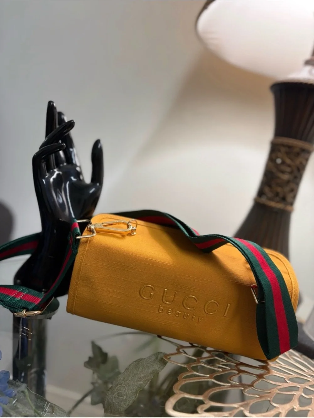 Gucci mustards yellow cylinder from beauty collection.